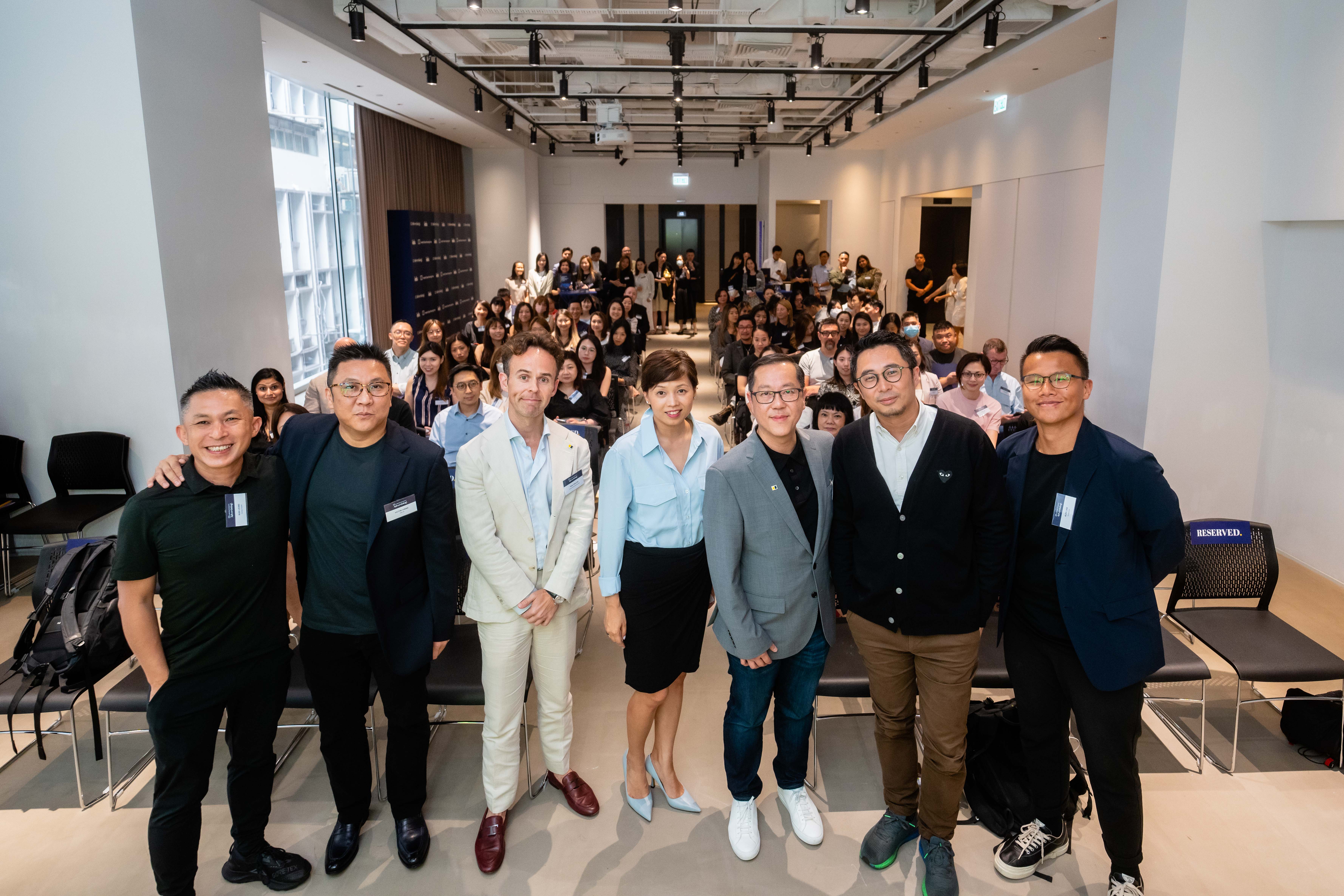 Group photo of the White Paper Launch Event, with speakers and presenters in the first row.